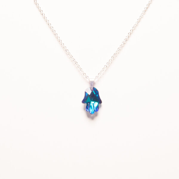 ACEC16-CONJUNTO DE ACERO CON DIJE MANO DE CRISTAL