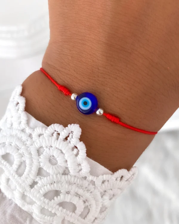 PUH01- PULSERA HILO ROJO CON OJO TURCO Y BOLITAS DE PLATA 925